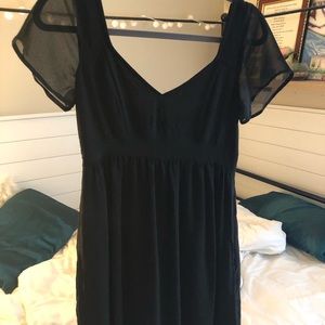 Black mini dress with sheer cap sleeves